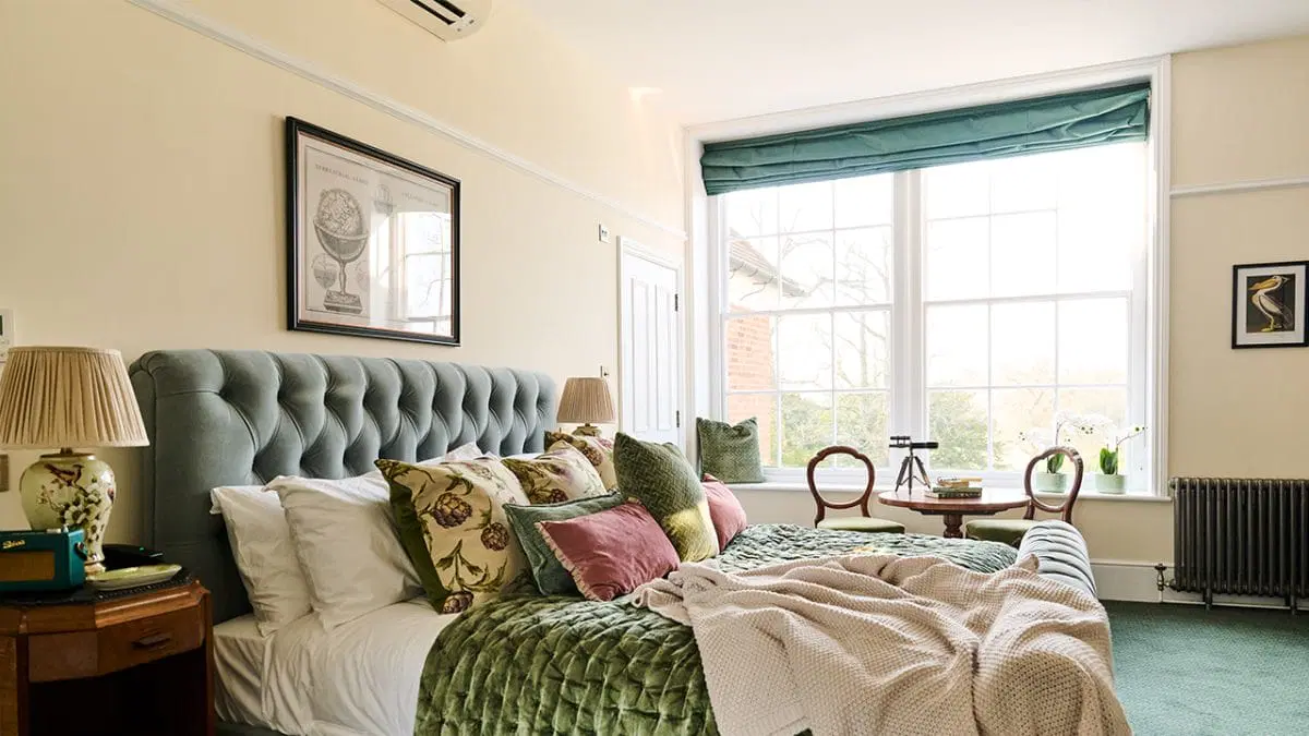 A cosy bedroom suite at West Court Retreat, Nirvana Spa's overnight stay partner
